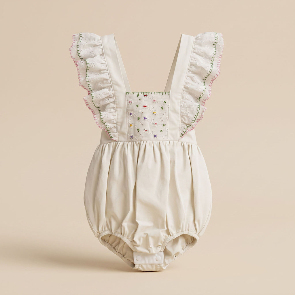 Candy ONESIE en ojalillo blanco con bordado a mano