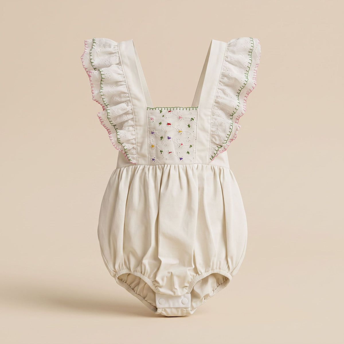 Candy ONESIE en ojalillo blanco con bordado a mano