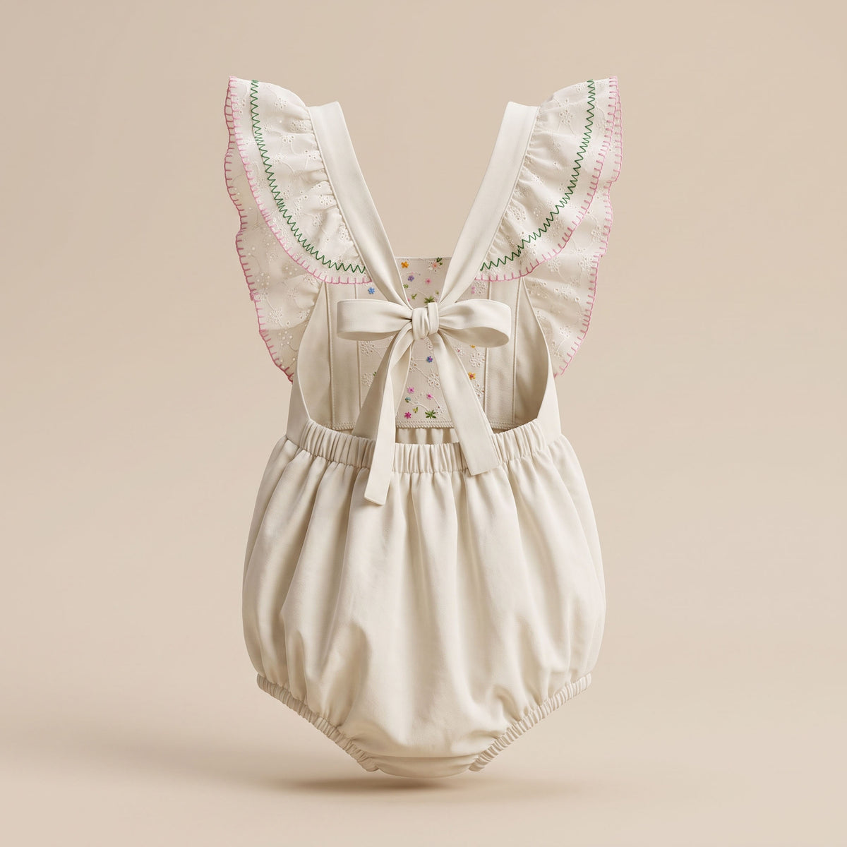 Candy ONESIE en ojalillo blanco con bordado a mano